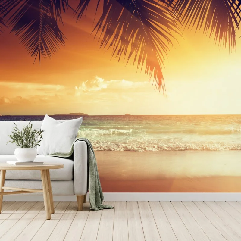 Carta da parati tramonto ai Caraibi con palme in silhouette