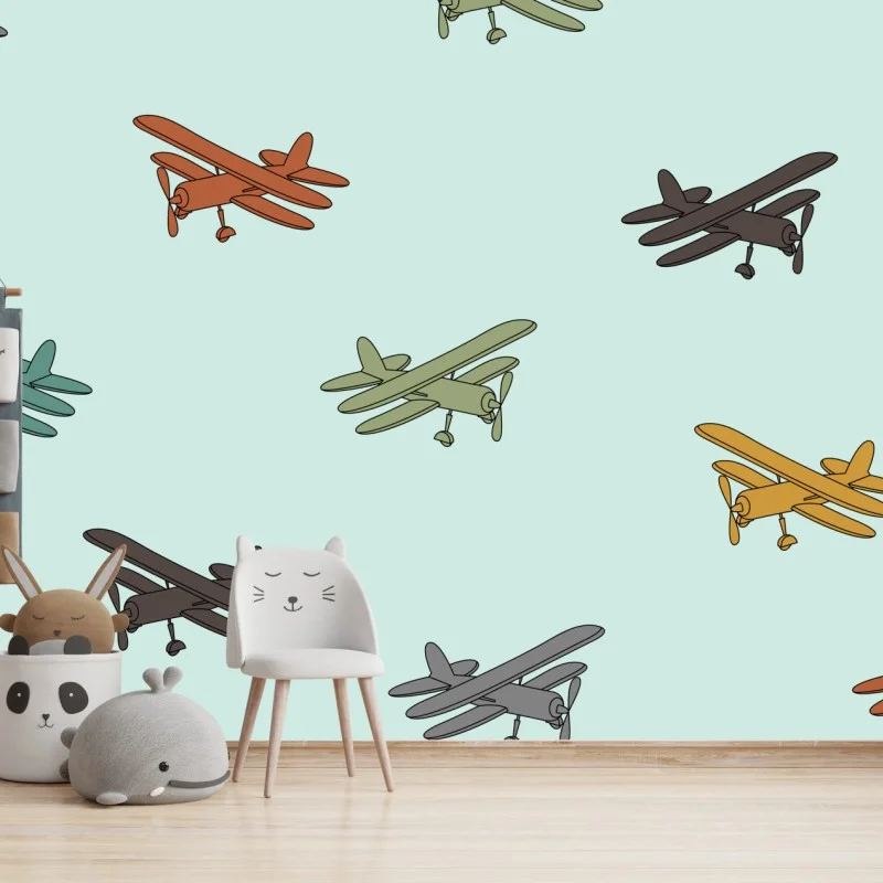 Carta da parati cieli vintage con biplani colorati