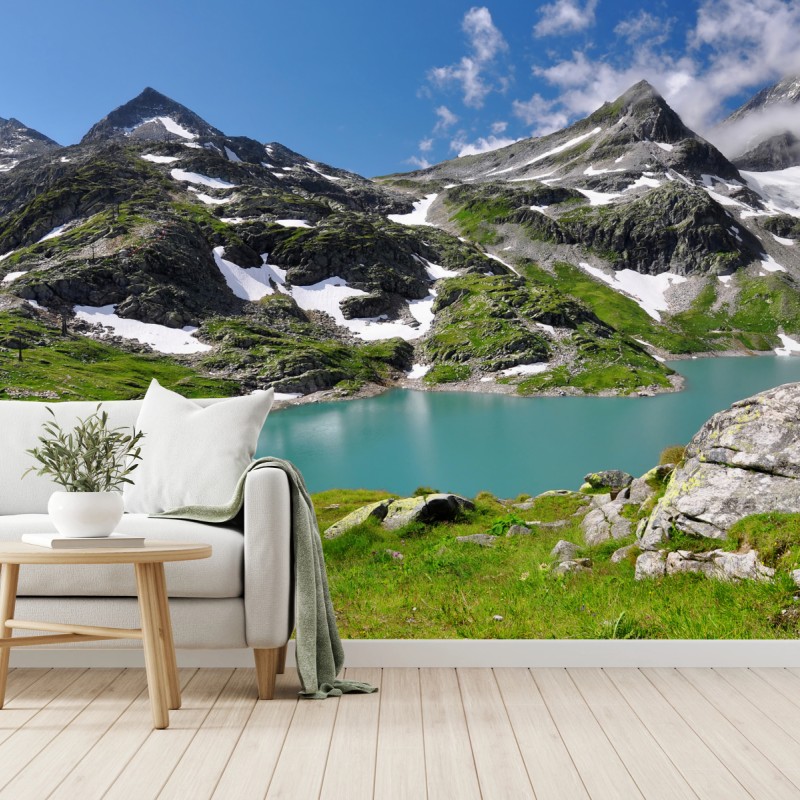 Carta da parati lago alpino turchese tra le montagne