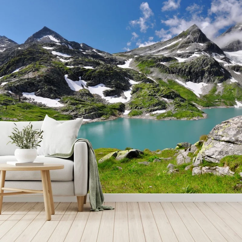 Carta da parati lago alpino turchese tra le montagne