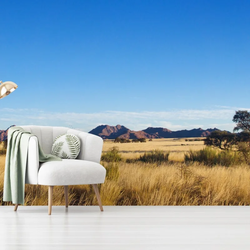 Carta da parati savana dorata e montagne lontane • Wallissimo®