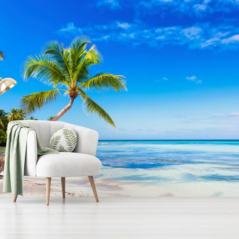 Carta da parati paesaggio tropicale con palma inclinata sul mare