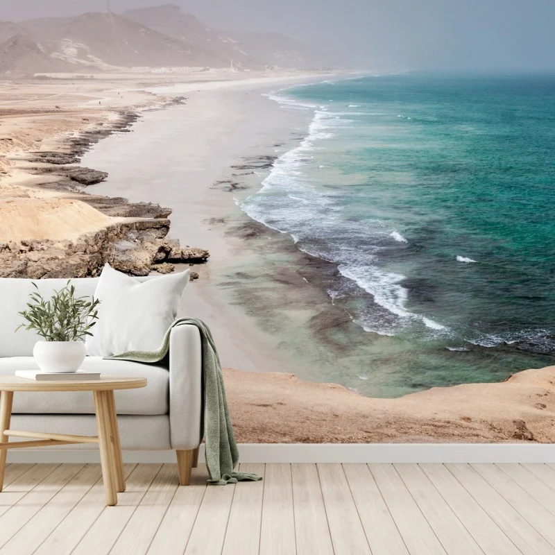 Carta da parati orizzonte turchese: costa deserta e scogliere