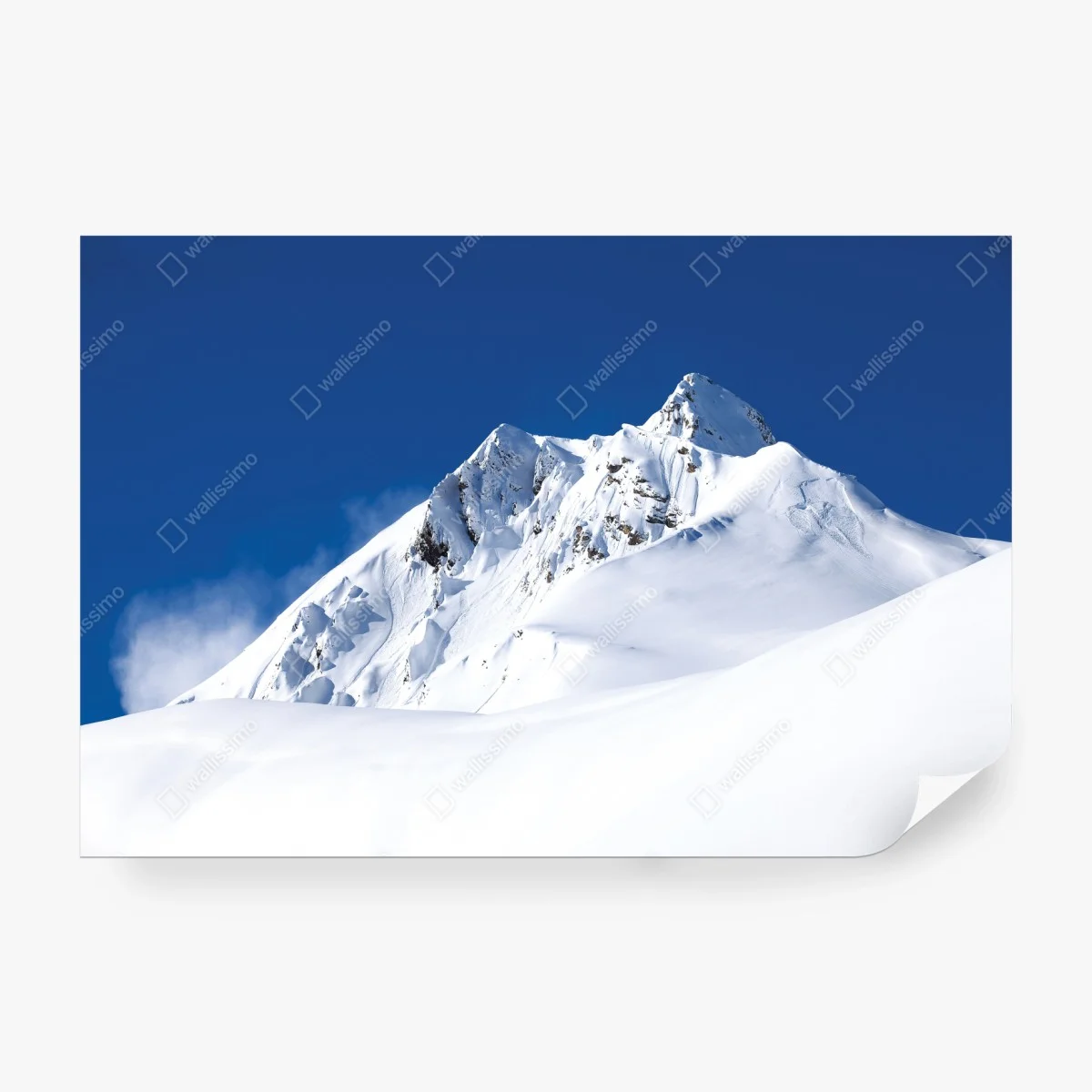 Carta da parati cima innevata sotto un cielo terso • Wallissimo®