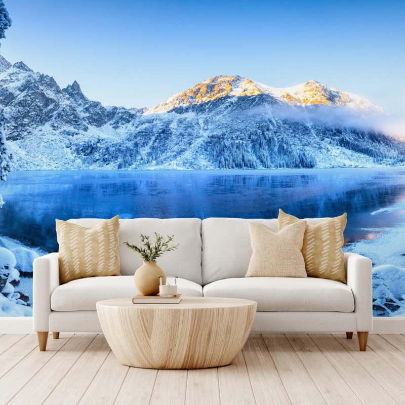 Carta da parati alba dorata sul lago innevato