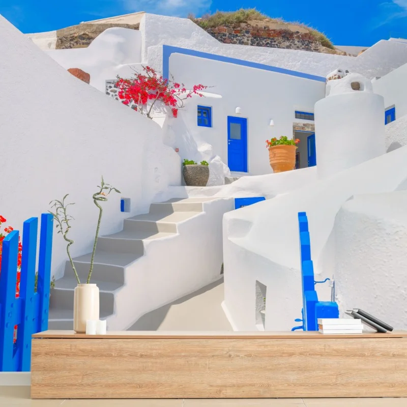 Carta da parati panorama di case bianche e porte blu a Santorini