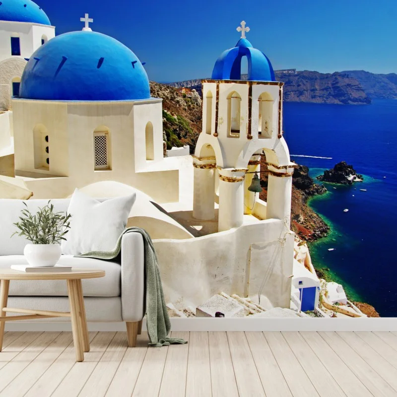 Carta da parati cupole blu di Santorini sul mare