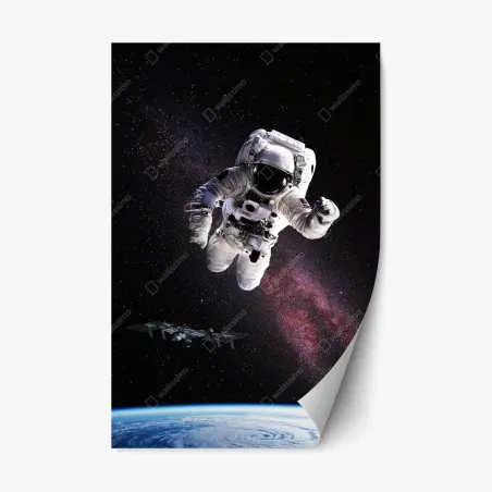 Adesivo riposizionabile astronauta in orbita sopra la terra • Wallissimo®