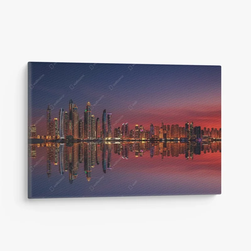 Quadro su tela skyline notturno di Dubai con riflesso spettacolare