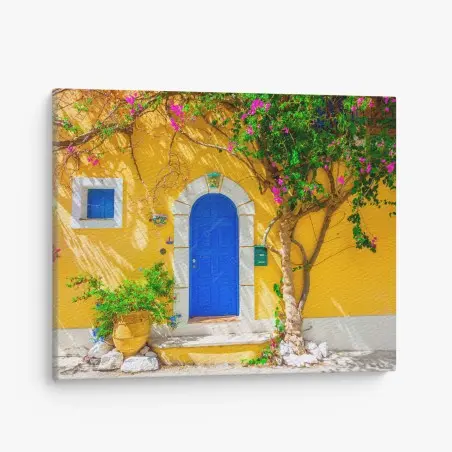 Quadro su tela porta ad arco blu su muro giallo di Assos, Kefalonia • Wallissimo®