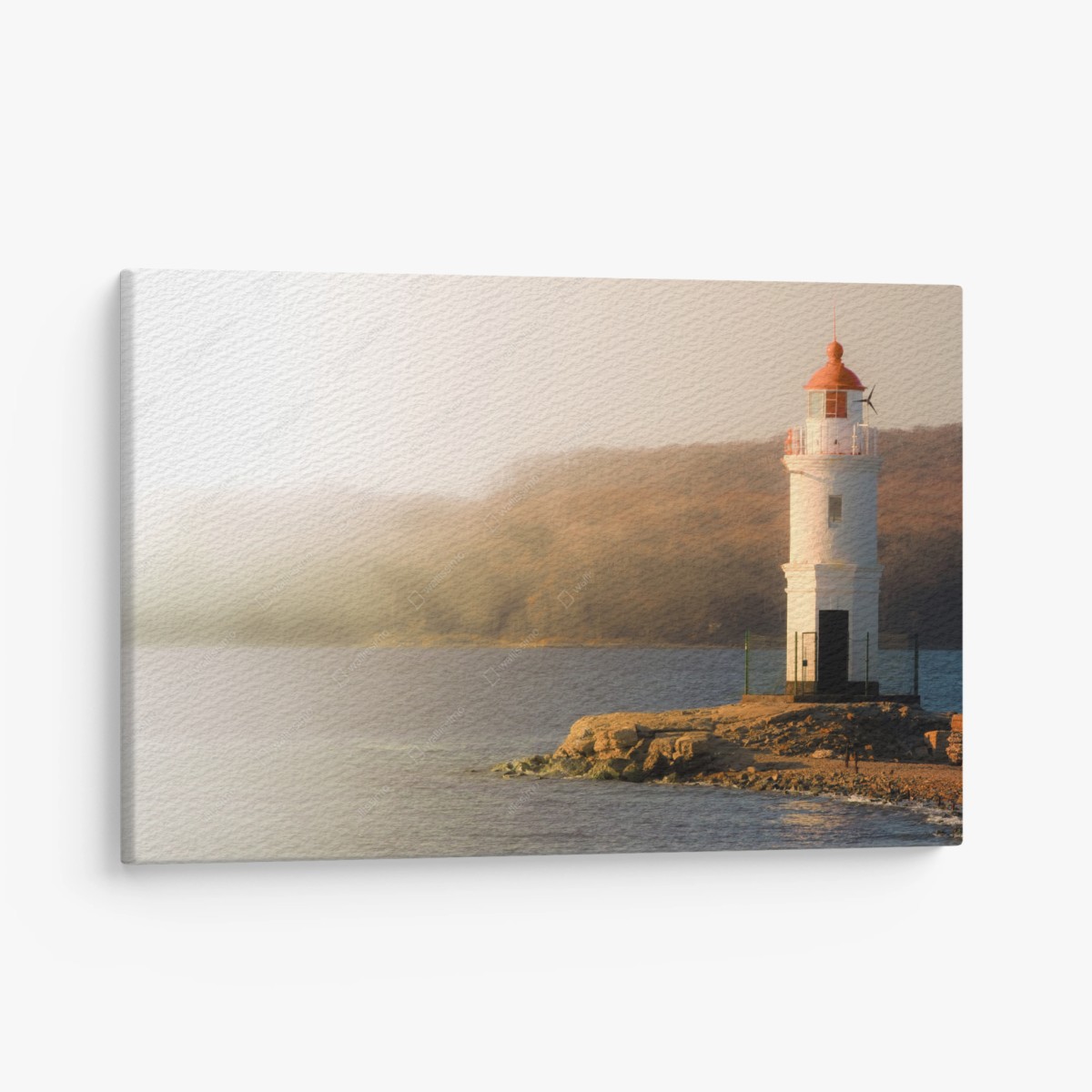 Quadro su tela faro al tramonto su costa rocciosa • Wallissimo®
