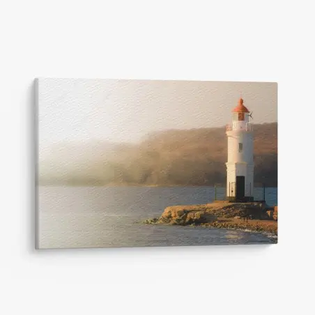 Quadro su tela faro al tramonto su costa rocciosa • Wallissimo®