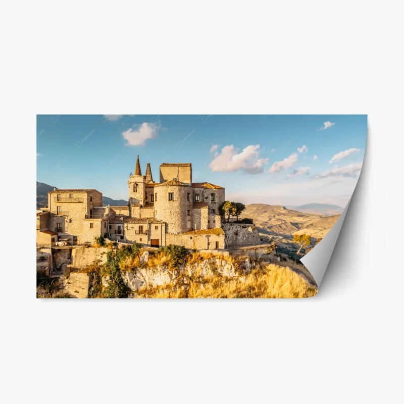 Adesivo riposizionabile borgo medievale arroccato sul dirupo al tramonto