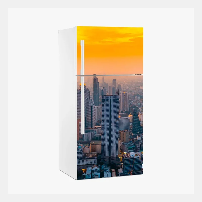 Adesivo per frigorifero tramonto dorato sulla metropoli