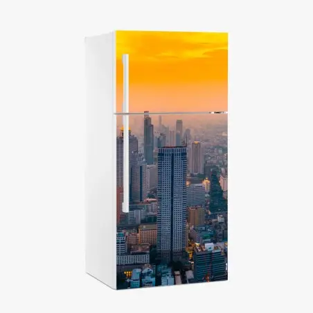 Adesivo per frigorifero tramonto dorato sulla metropoli • Wallissimo®