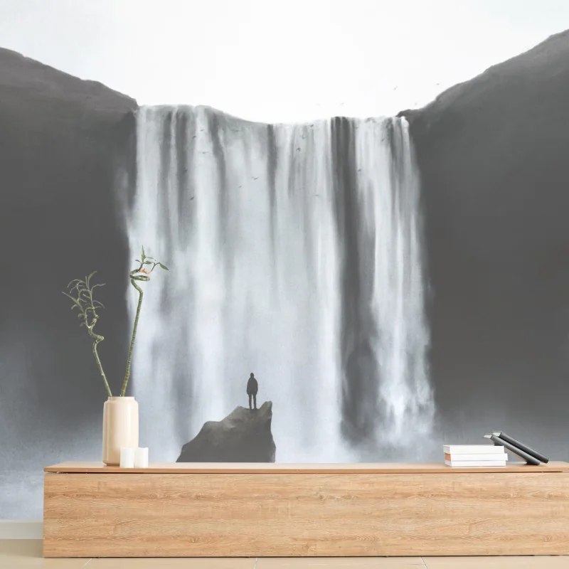 Carta da parati cascata maestosa e figura solitaria