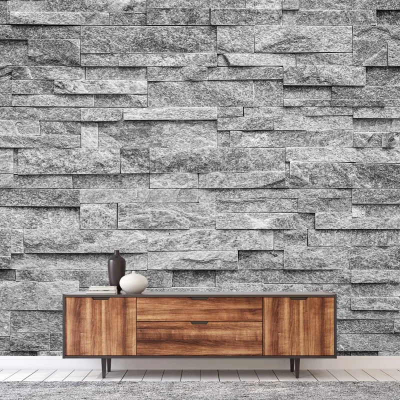 Carta da parati rivestimento in pietra grigia effetto materico