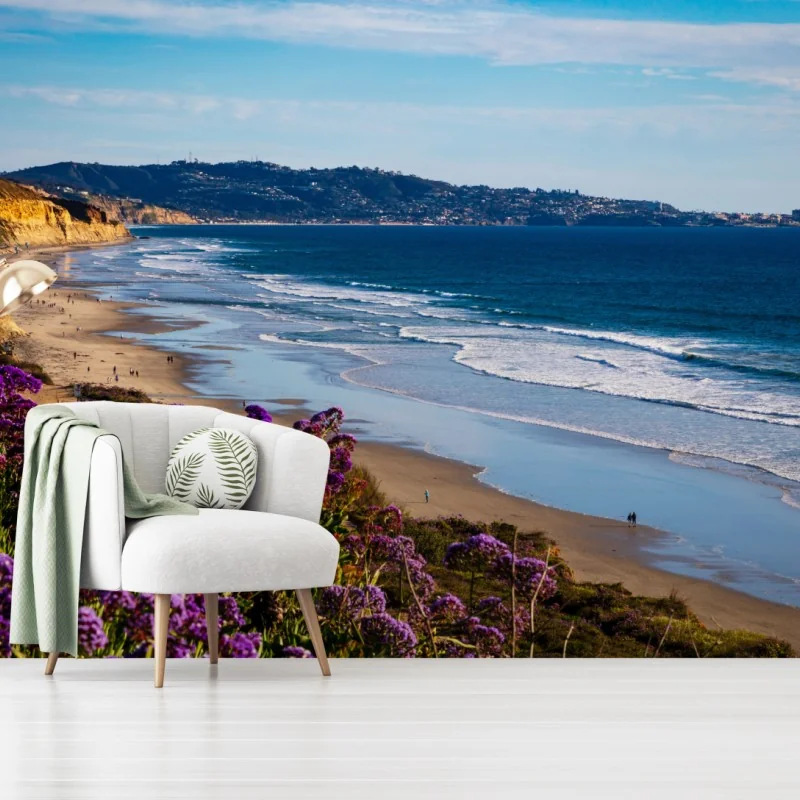 Carta da parati panorama costiero con fiori viola e scogliera