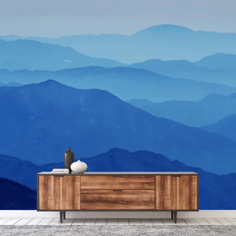 Carta da parati orizzonte di montagne blu sfumate