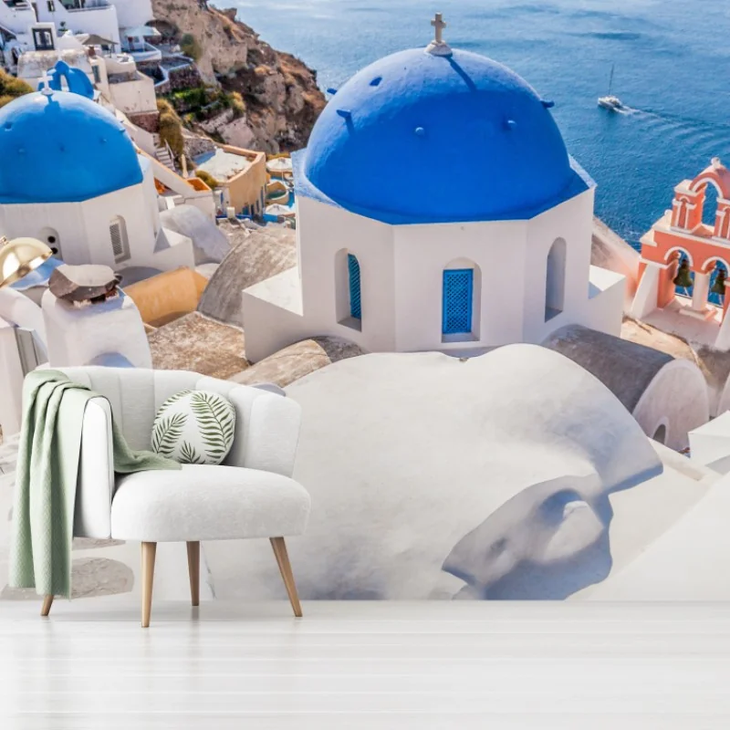 Carta da parati panorama marino di Santorini con cupole blu