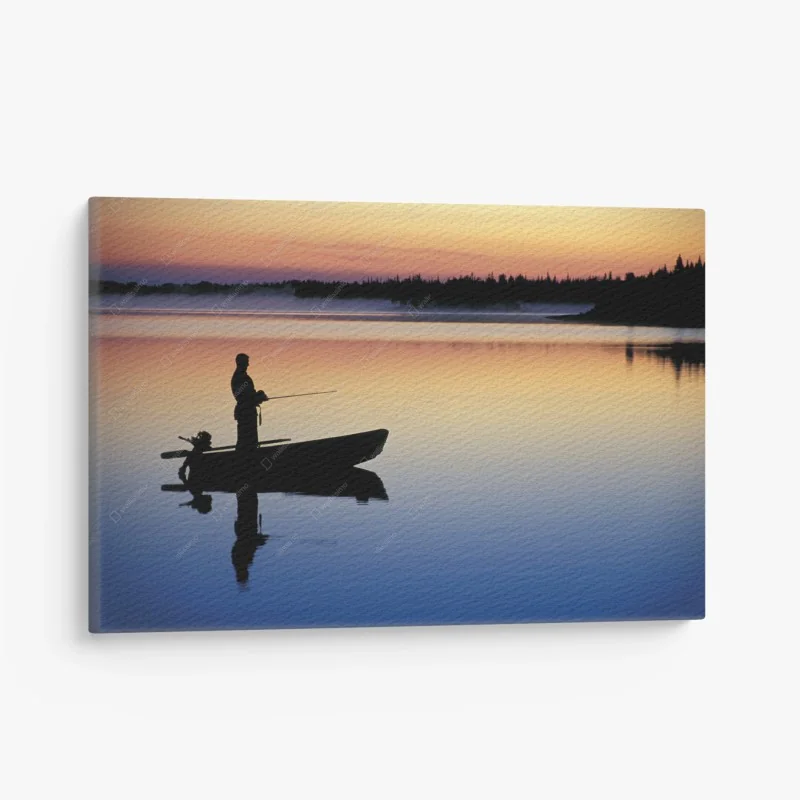 Quadro su tela silhouette di pescatore al tramonto sul lago