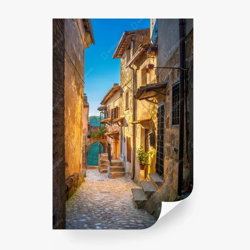 Carta da parati vicoletto medievale in Toscana al tramonto