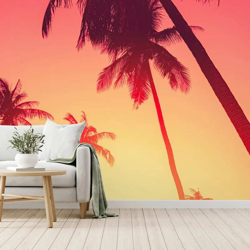 Carta da parati tramonto tropicale con palme in silhouette