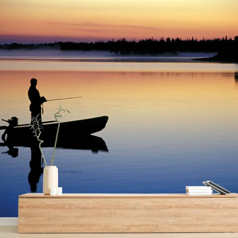 Carta da parati silhouette di pescatore al tramonto sul lago