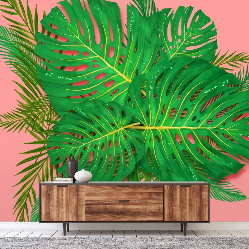 Carta da parati vibrante fogliame tropicale su sfondo rosa