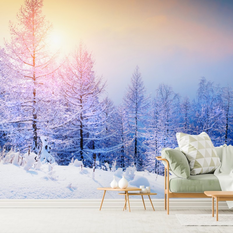 Carta da parati tramonto dorato sulla foresta innevata