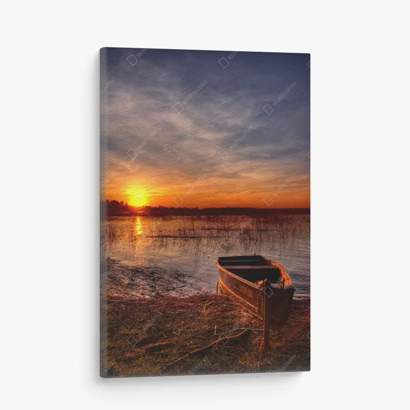 Quadro su tela tramonto dorato sul lago con barca in riva