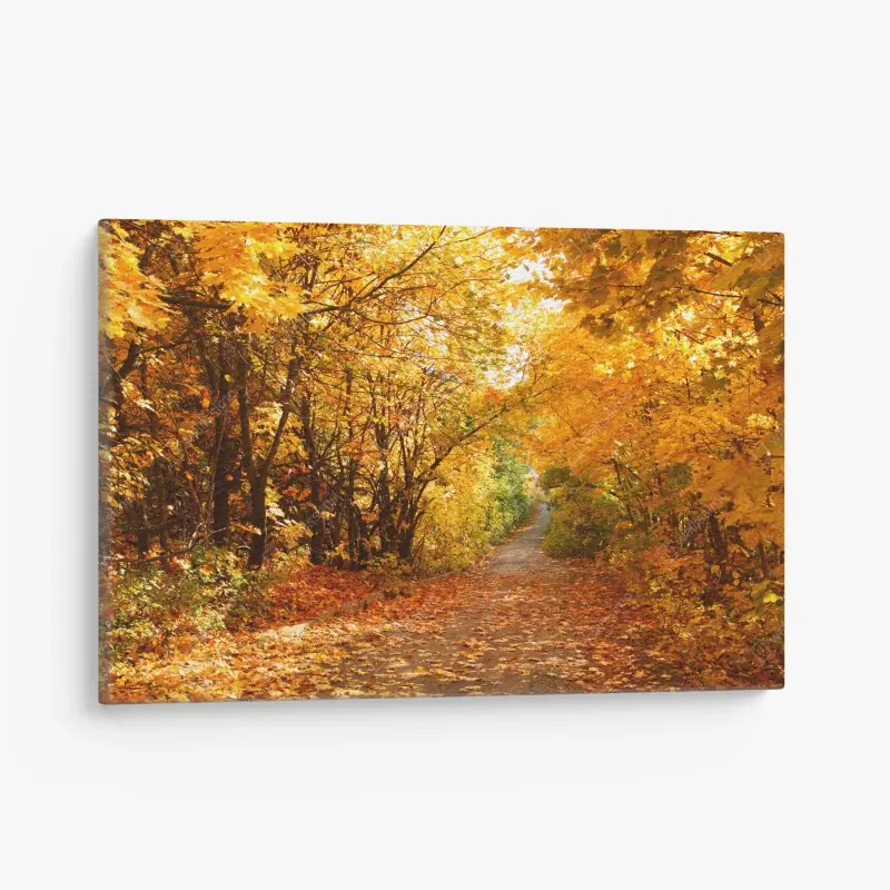 Quadro su tela viale autunnale dalle foglie dorate