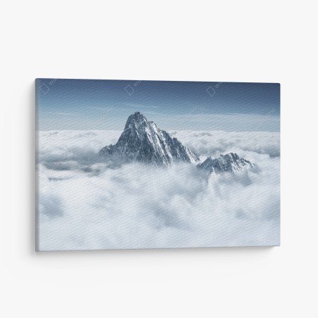 Quadro su tela vette innevate oltre le nuvole • Wallissimo®