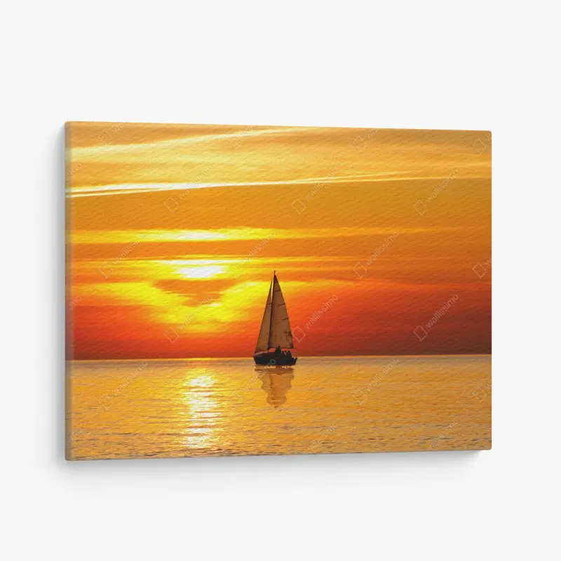 Quadro su tela tramonto dorato sul mare con barca a vela