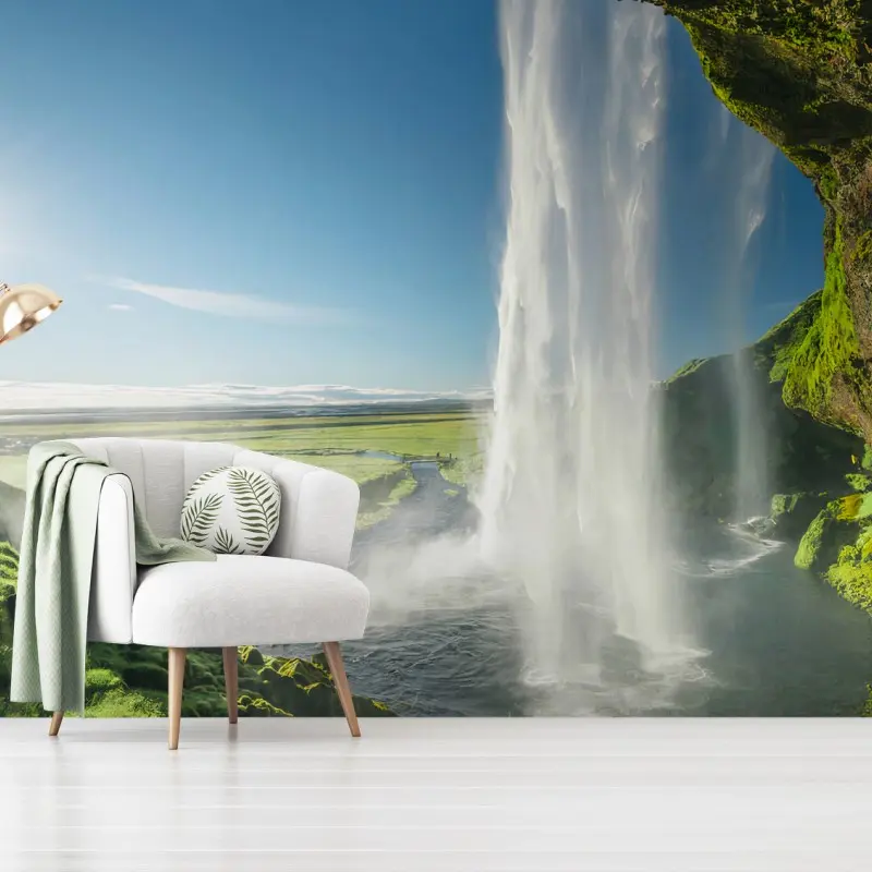 Carta da parati ISLANDA CASCATA PAESAGGIO VERDE SOLE PER SOGGIORNO